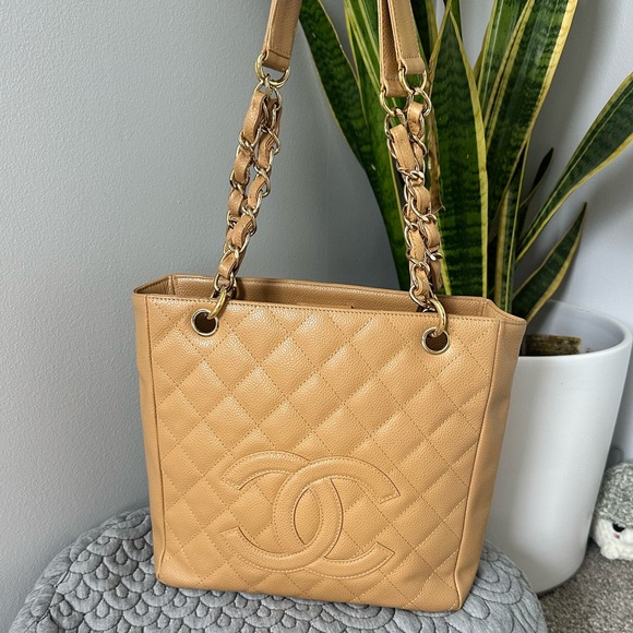 CHANEL Handbags - EUC💛Chanel Caviar Leather Petite Shopping Tote Beige